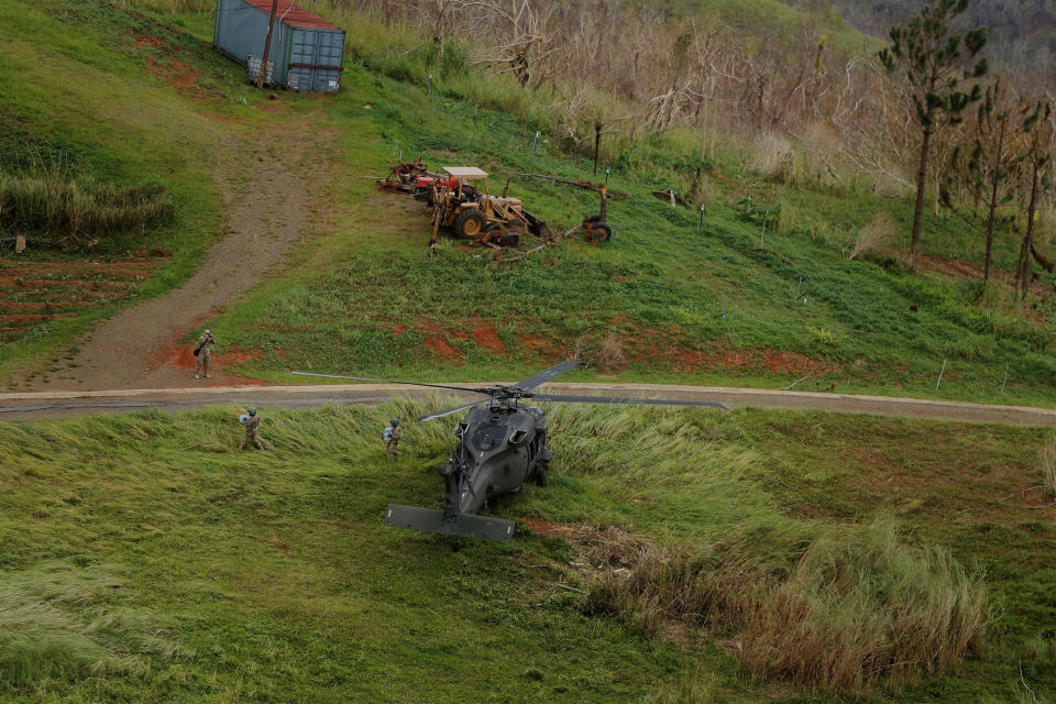 A helicopter from U.S. Army’s First Armored Division’s Combat Aviation Brigade lands in a field to deliver food and water during recovery efforts following Hurricane Maria near Ciales, P.R., on Oct. 7. (Photo: Lucas Jackson/Reuters)