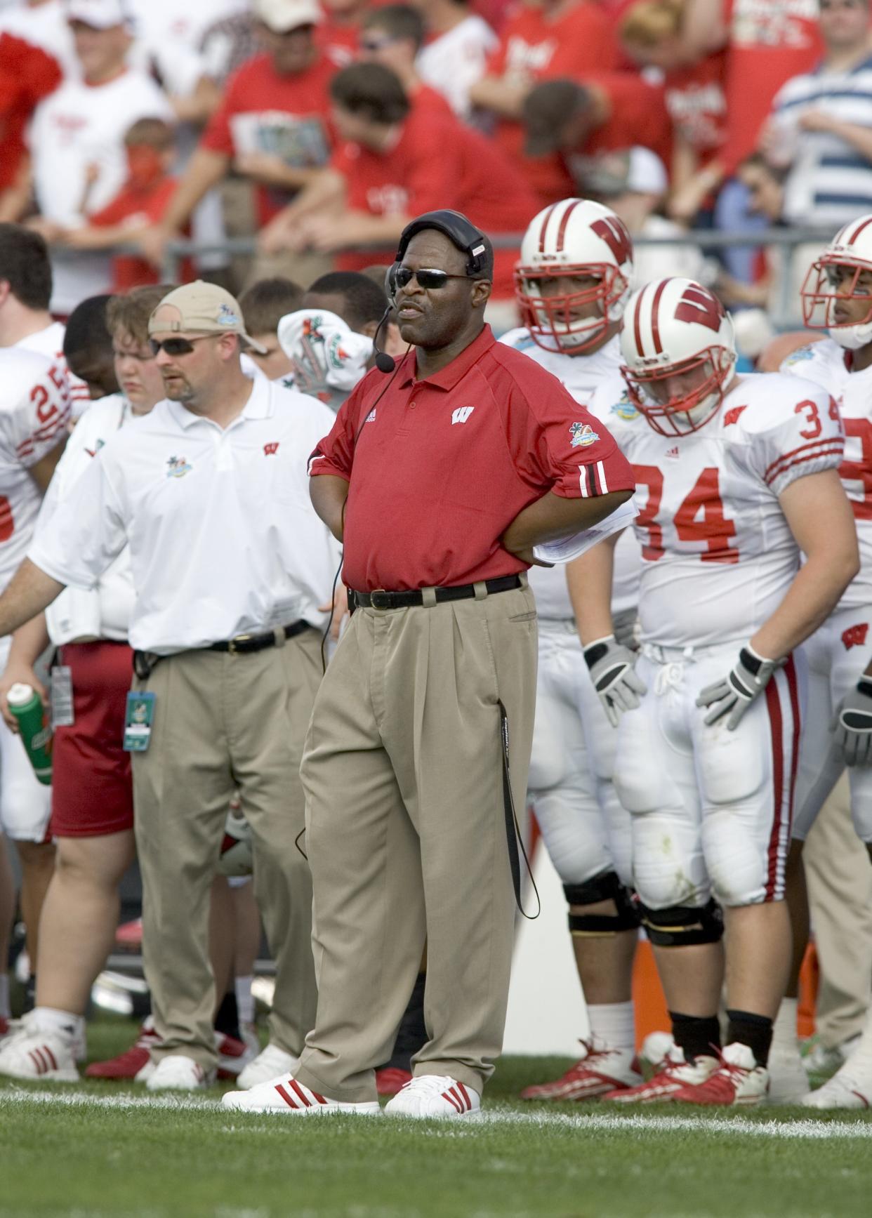 Henry Mason coached wide receivers at Wisconsin from 1995 through 2006 before suffering a spinal cord injury. He subsequently took a job working with NFL personnel and high school coaches, beginning with the 2009 season.