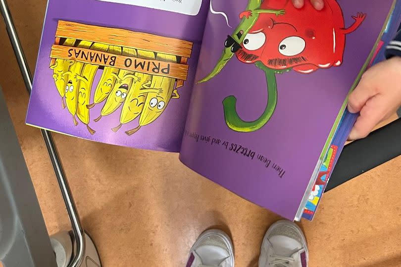 Alex shared a picture of her son, Kit, reading a book after surgery