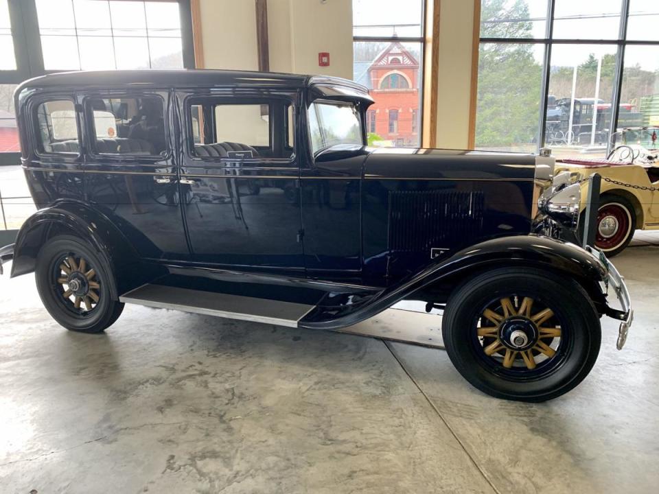 <img src="1930-oldsmobile.jpg" alt="A 1930 Oldsmobile Standard Six four-door sedan on display at the Museum of Transportation">