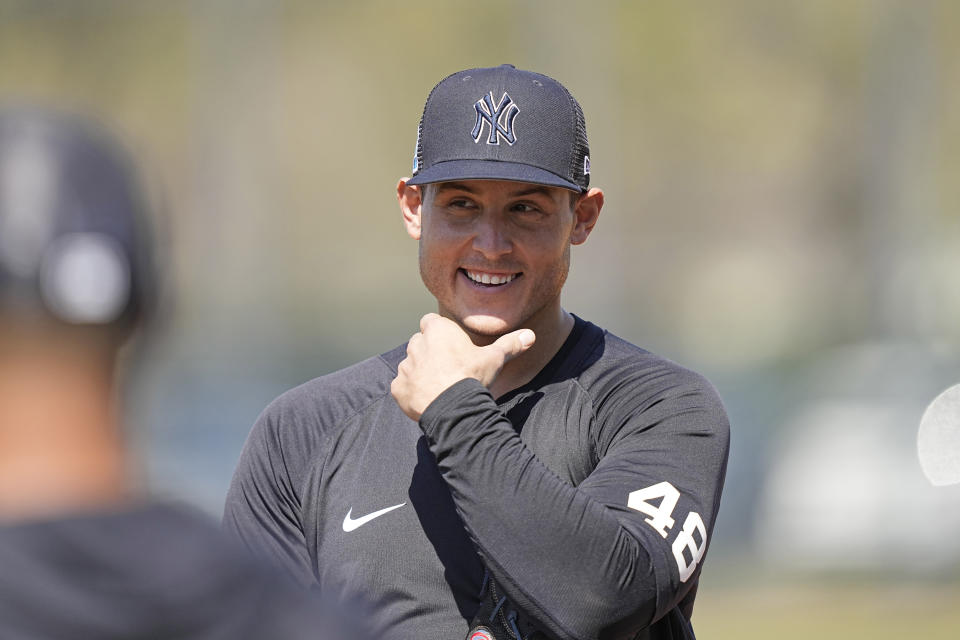 New York Yankees' Anthony Rizzo waits for the start of fielding drills during a spring training baseball workout Monday, Feb. 20, 2023, in Tampa, Fla. (AP Photo/David J. Phillip)