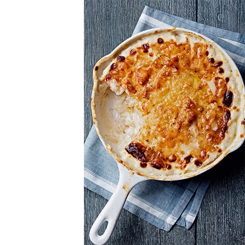 <p>Combine russet potatoes, Gruyère, and fresh cream to create this ultra creamy dish.</p><p><em>Get the recipe at <a href="http://www.countryliving.com/food-drinks/recipes/a4567/potato-gratin-recipe-clx1113/" rel="nofollow noopener" target="_blank" data-ylk="slk:Country Living" class="link ">Country Living</a>.</em></p>