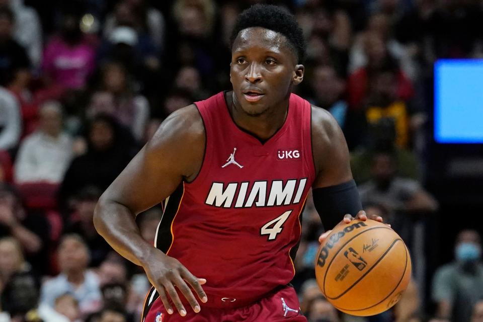 FILE - Miami Heat guard Victor Oladipo (4) dribbles the ball during the second half of an NBA basketball game against the Houston Rockets, Monday, March 7, 2022, in Miami. Oladipo signed a new two-year contract to remain with the Heat, Thursday, July 7, 2022. (AP Photo/Marta Lavandier, File)