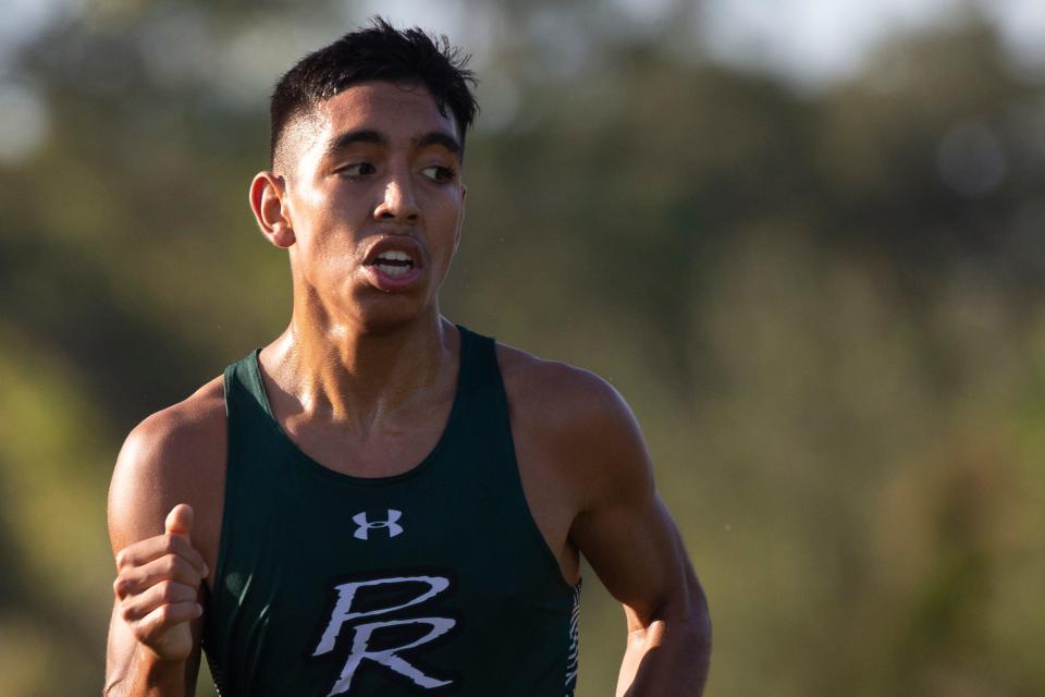 Palmetto Ridge’s Bernardo Barnhart wins the boy’s CCAC cross country meet, Wednesday, Oct. 20, 2021, at Palmetto Ridge High School in Naples, Fla.Naples High School won the boy’s and girl’s cross country team competitions.