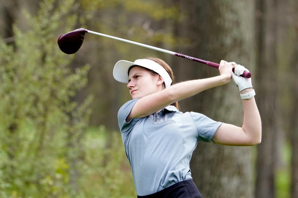 Mary Korab of Morris Catholic hits her tee shot during the Morris County Golf Tournament at Flanders Valley Golf Course on Tuesday, May 3, 2022.
