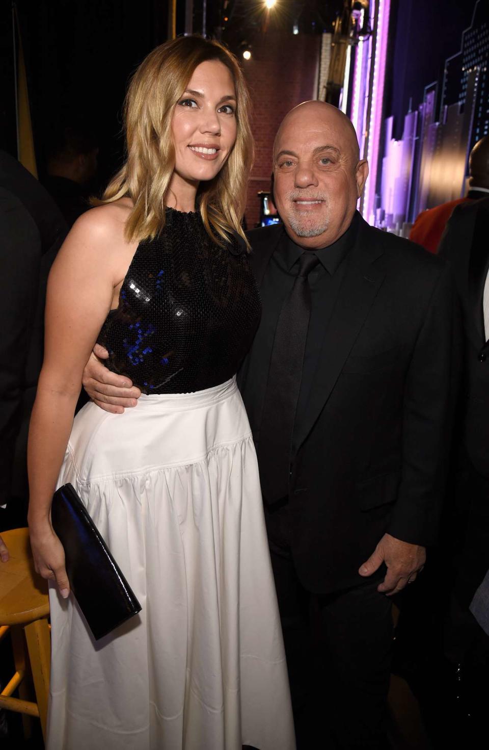 Billy Joel and Alexis Roderick pose backstage during the 72nd Annual Tony Awards at Radio City Music Hall on June 10, 2018 in New York City