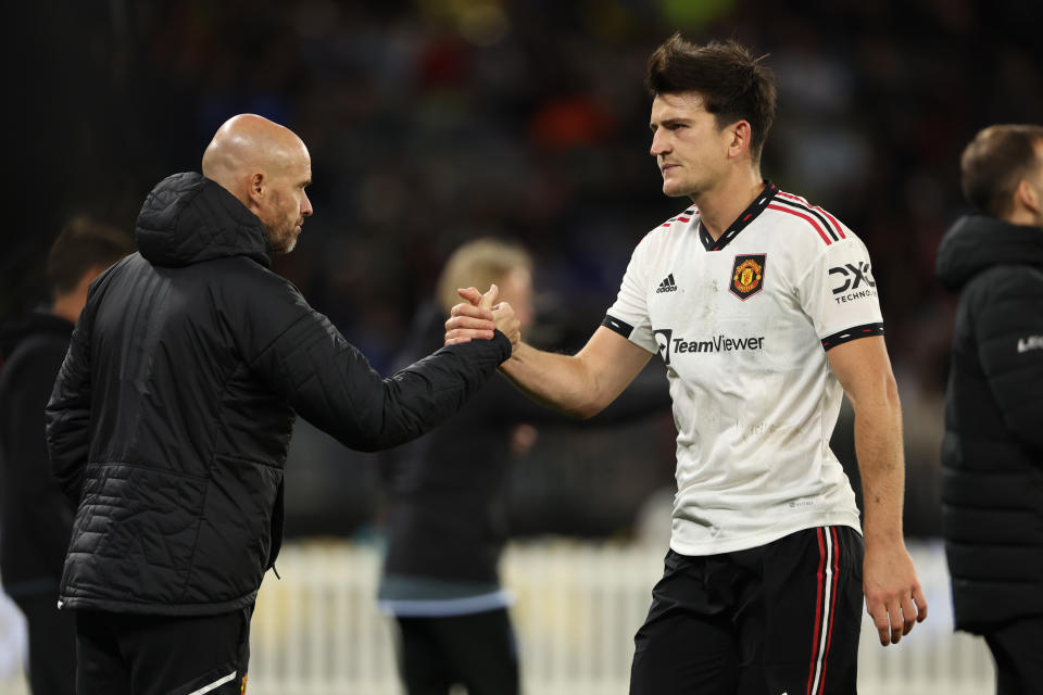 Manchester United manager Erik Ten Hag (left) with defender Harry Maguire during the pre-season friendly match against Aston Villa in Perth.