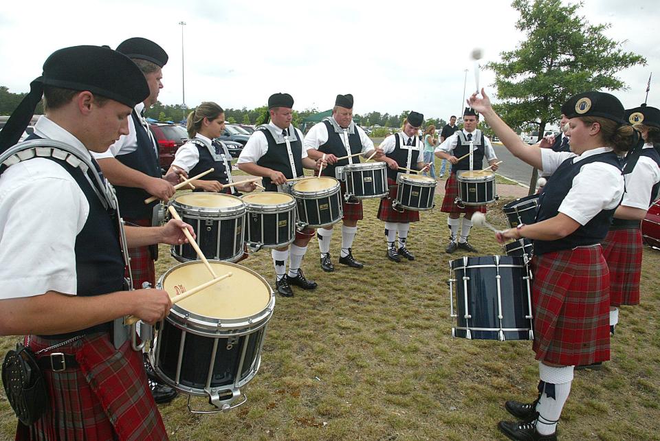 Members of the Oran Moore Pipeband warm up before a competition during the 37th New Jersey Irish Festival in Lakewood.