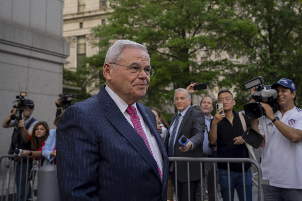 Sen. Bob Menendez, D-N.J., foreground, leaves Manhattan federal court, Friday, June 7, 2024, in New York. (AP Photo/Adam Gray)