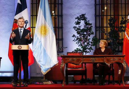 Argentina's president Mauricio Macri speaks next to Chile's President Michelle Bachelet during a meeting at the government house during his official visit in Santiago, Chile June 27, 2017. REUTERS/Rodrigo Garrido