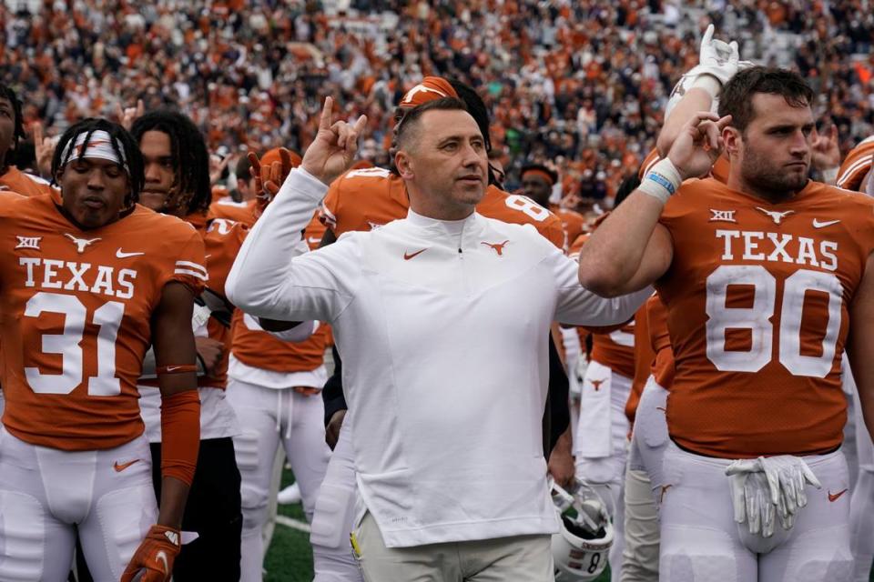 Texas head coach Steve Sarkisian, center, celebrated after the Longhorns beat Kansas State 22-17 on Nov. 26, 2021. Kentucky will visit Austin to face Texas in 2024, the Longhorns’ first season as a member of the SEC.