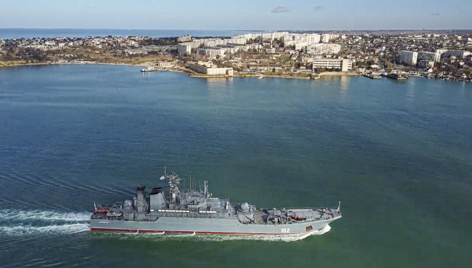 FILE - In this photo released by Russian Defense Ministry Press Service on Feb. 10, 2022, the Russian navy's amphibious assault ship Kaliningrad sails into the Sevastopol harbor in Crimea. Successful Ukrainian drone and missile strikes have provided a major morale boost for Kyiv at a time when its undermanned and under-gunned forces are facing Russian attacks along the more than 1,000-kilometer front line. Challenging Russia’s naval superiority also has helped create more favorable conditions for Ukrainian grain exports and other shipments from the country’s Black Sea ports. (Russian Defense Ministry Press Service via AP, File)