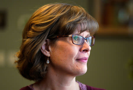 Kari Escher, former manager at Sunset Funeral Directors, poses for a portrait in Montrose, Colorado, U.S., December 17, 2017. REUTERS/Rick Wilking