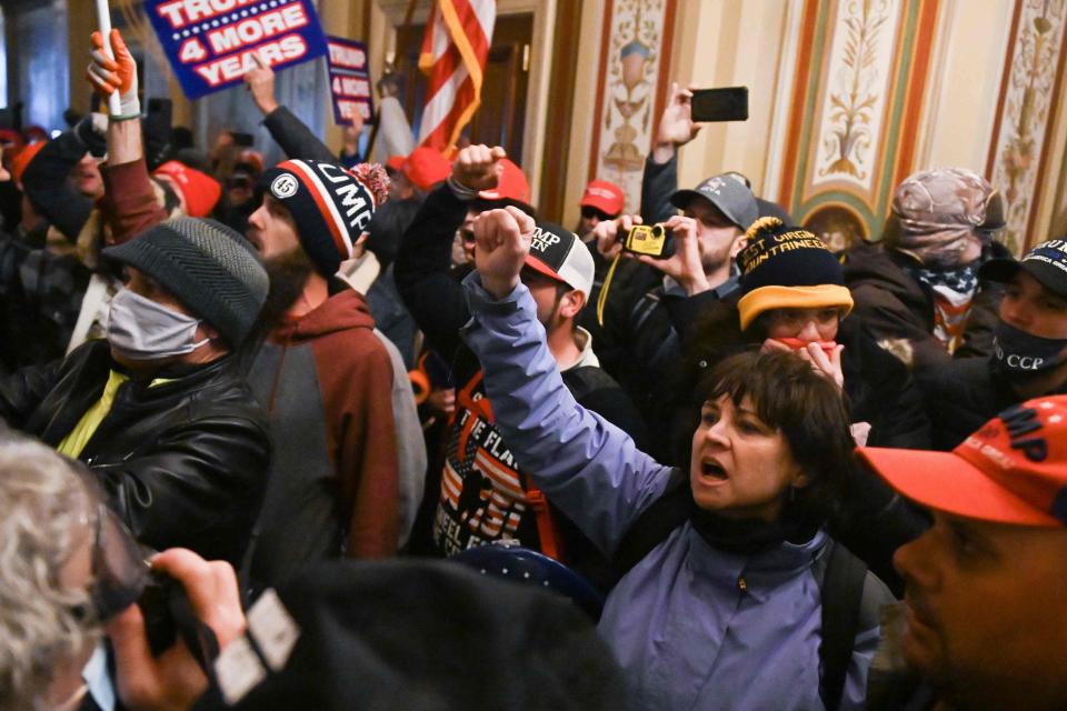 Supporters of US President Donald Trump protest inside the US CapitolAFP via Getty Images