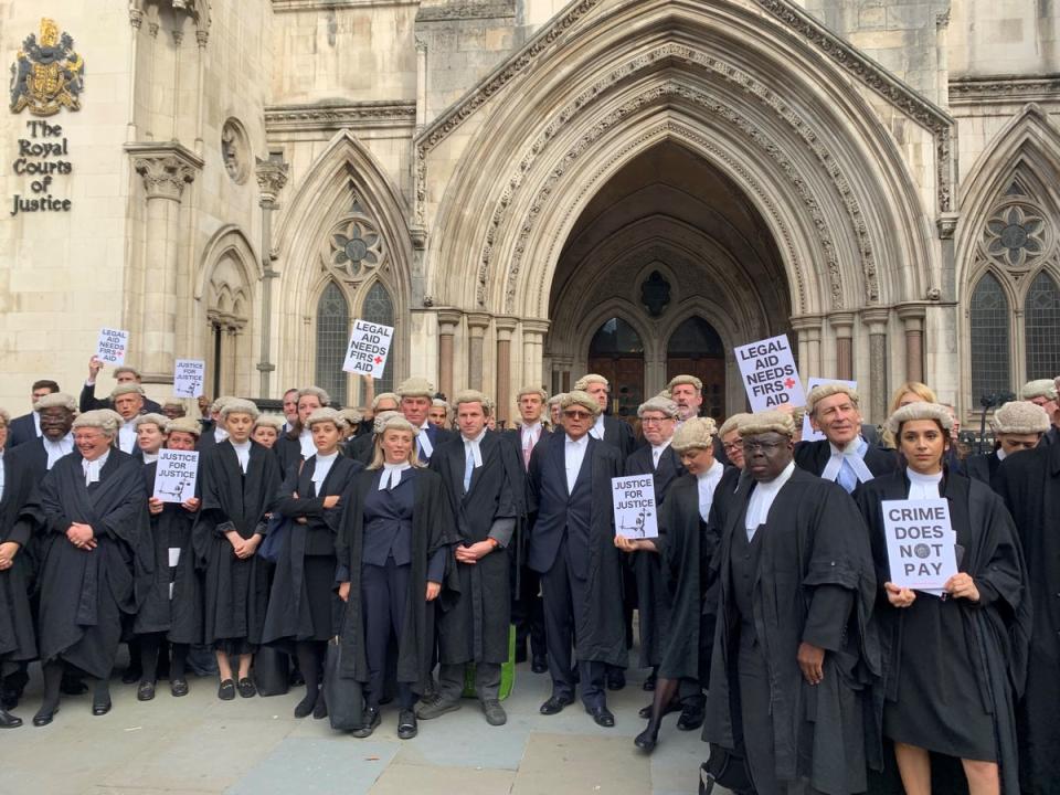 28 September 2022: Criminal barristers from the Criminal Bar Association (CBA), demonstrates outside the Royal Courts of Justice in London, as part of their ongoing pay row with the Government (PA)