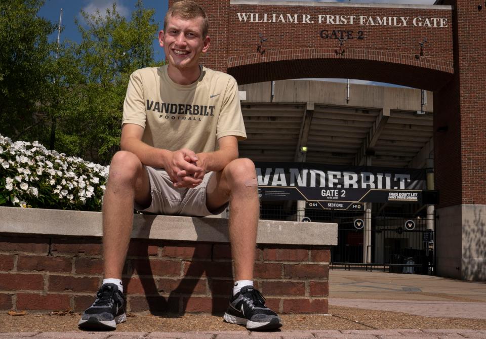 Connor Bosse poses for a portrait outside FirstBank Stadium Wednesday, Sept. 7, 2022 in Nashville, Tenn. Bosse who participated in therapy with the Saddle Up! program, which helps people with disabilities through equestrian therapy, is now a Vanderbilt student and an assistant equipment manager for the football team.