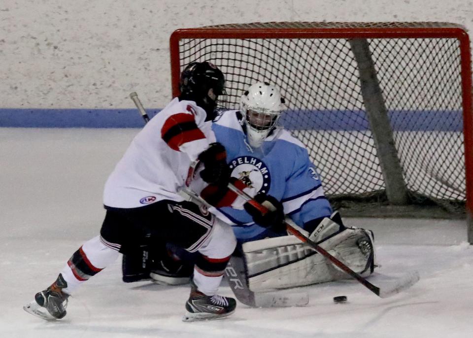 Pelham goalie Jack Mallinson makes a save during Pelham's 7-0 win Jan. 19, 2022 over Rye at Playland Ice Casino. Mallinson had 21 saves for the game.