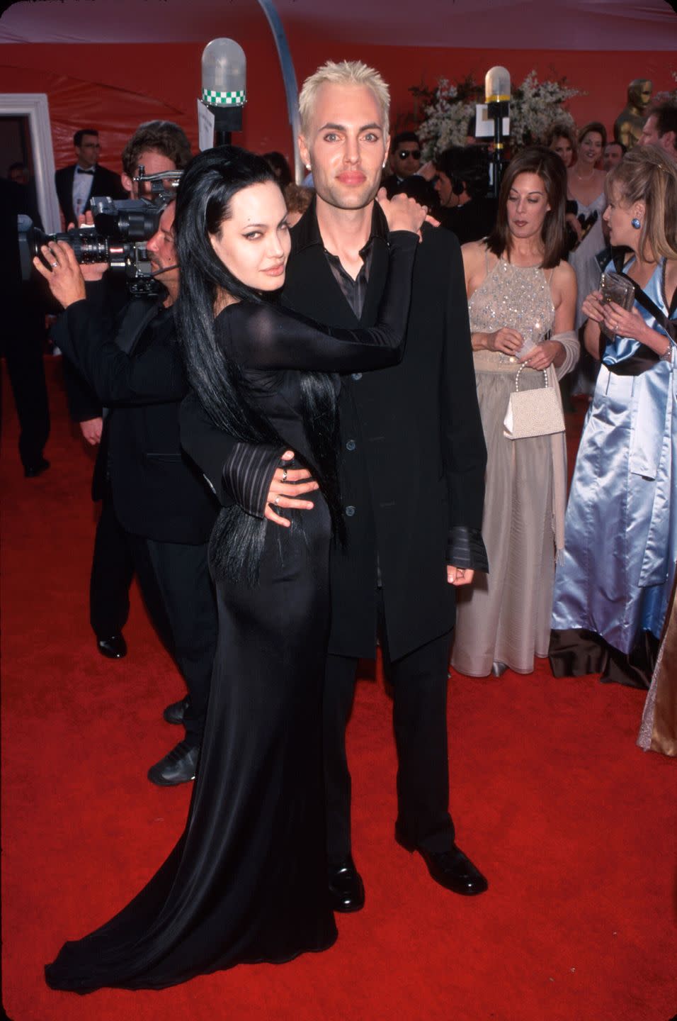 2000: Angelina Jolie says she's "so in love" with her brother