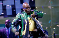 FILE PHOTO: President Jacob Zuma dances at a victory rally of his ruling African National Congress (ANC) in Johannesburg May 10, 2014. REUTERS/Mike Hutchings /File Photo