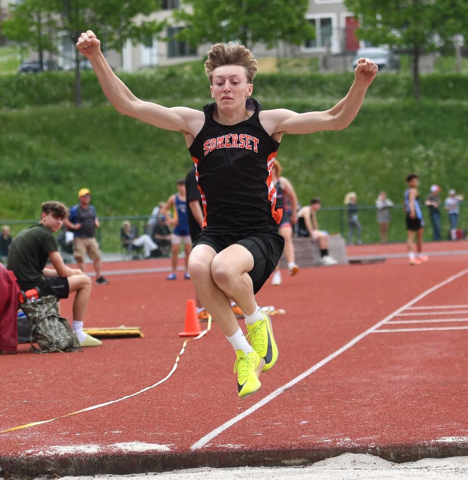 Somerset's Maverick Swank takes a turn at the boys' triple jump during the LHAC track and field championships, May 7, at St. Francis University.