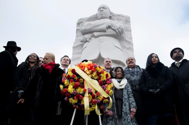 Martin Luther King III, US Secretary of the Interior Ryan Zinke and others take part in a ceremony at the Martin Luther King Memorial on the National Mall in Washington