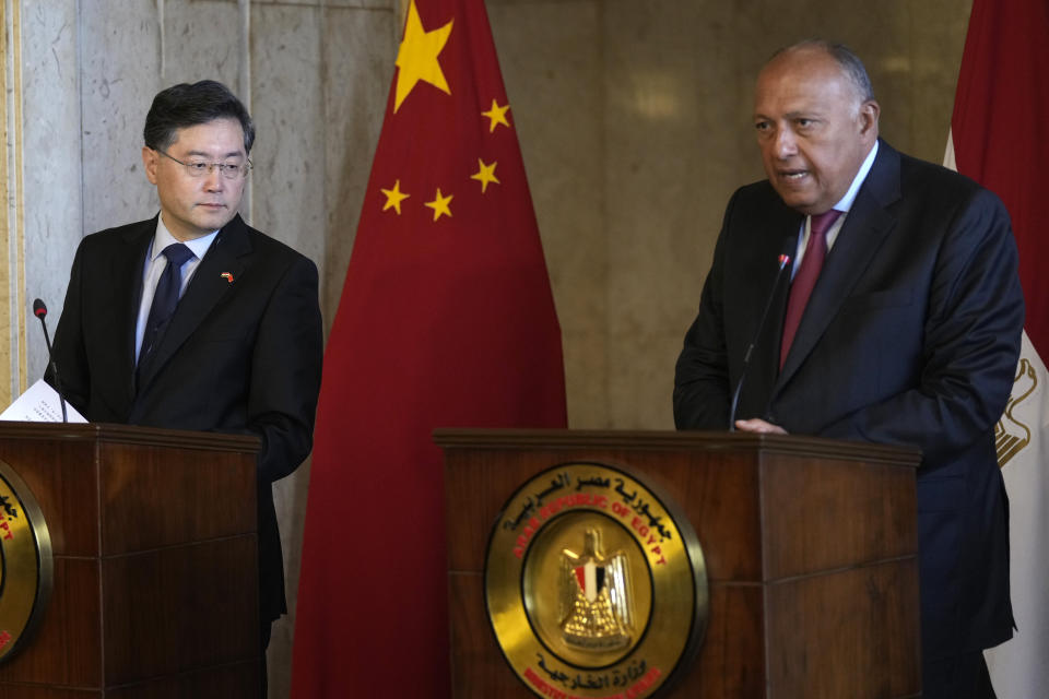 Chinese Foreign Minister Qin Gang, left, listens during a press conference with his Egyptian counterpart Sameh Shoukry, at the foreign ministry headquarters in Cairo, Egypt, Sunday, Jan. 15, 2023. (AP Photo/Amr Nabil)