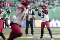 Calgary Stampeders quarterback Bo Levi Mitchell (19) looks to throw the ball during the first half of a CFL football game against the Saskatchewan Roughriders Sunday, Nov. 28, 2021 in Regina, Saskatchewan. (Kayle Neis/The Canadian Press via AP)