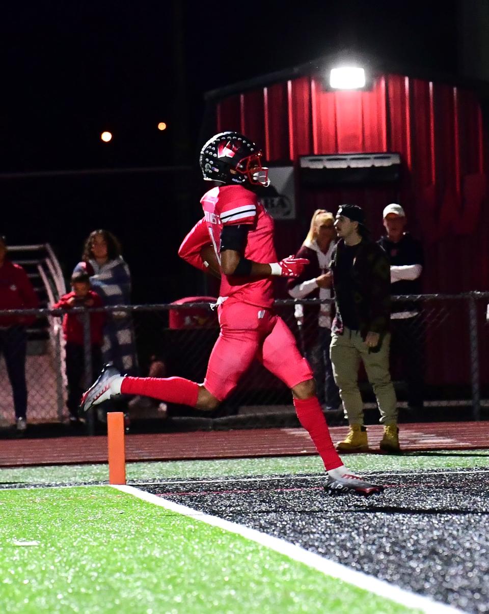 Malik Hartford scores on a pick six for Lakota West against Mason in a Greater Miami Conference football game Sept. 30, 2022.