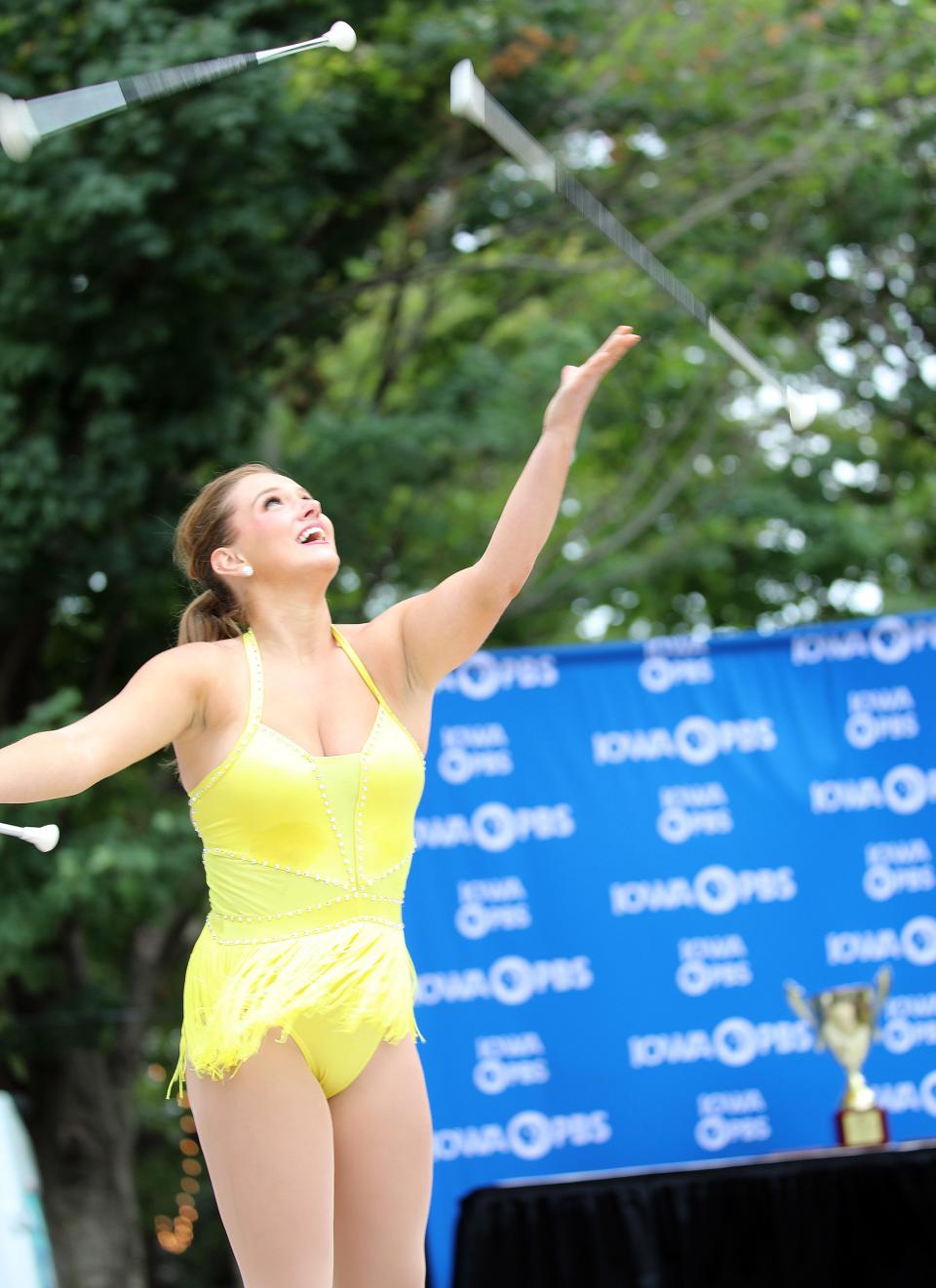 Grace Wood, 20, of Indianola performs twirling routine in the Senior division during the 62nd Bill Riley Talent Search finals on the Anne and Bill Riley Stage at the Iowa State Fair on Sunday, August 21, 2022, in Des Moines. Performers compete in two groups, Sprouts (ages 2-12) and Seniors (ages 13-21). More than $20,000 was awarded to the Sprouts and Senior divisions combined.