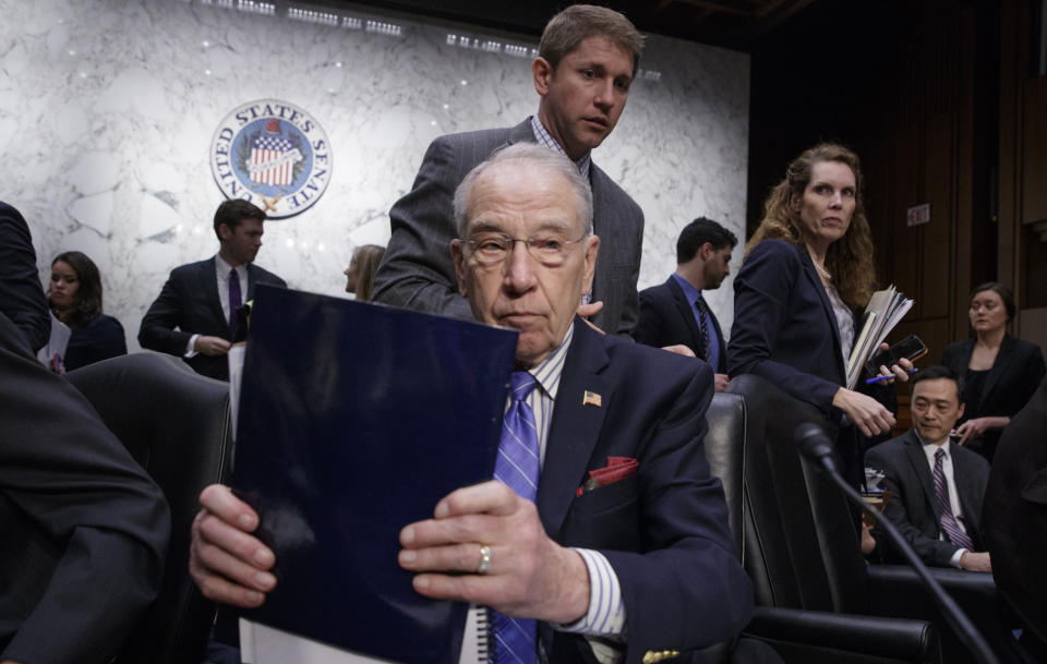 Senate Judiciary Committee Chairman Sen. Charles Grassley, R-Iowa, wraps up the meeting on Capitol Hill in Washington, Monday, April 3, 2017, after his panel voted along party lines on the nomination of President Donald Trump's Supreme Court nominee Neil Gorsuch. (AP Photo/J. Scott Applewhite)