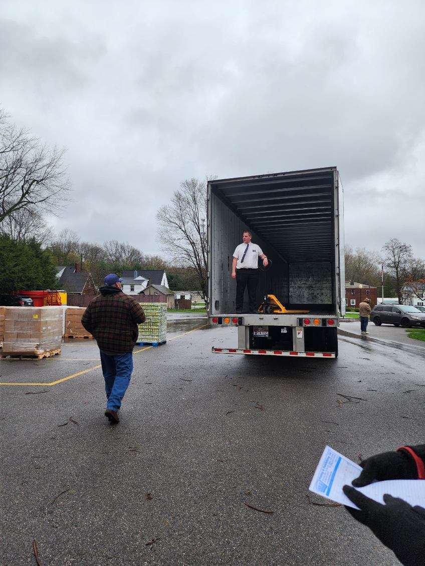 Salvation Army of Salem volunteers work to unload and sort a donation of food from The Church of Jesus Christ of Latter-Day Saints. The church donated 20,000 pounds of food to help alleviate food insecurity in Columbiana, Mahoning and other nearby counties.