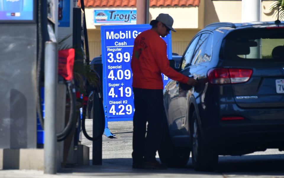 A driver closes the cap after filling up at a Los Angeles gas station on April 9, 2019, as southern California gas prices, already the highest in the nation, continue to rise. (Photo by Frederic J. BROWN / AFP)        (Photo credit should read FREDERIC J. BROWN/AFP/Getty Images)