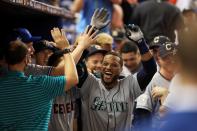 <p>Robinson Cano #22 of the Seattle Mariners and the American League celebrates with teammates after hitting a home run in the tenth inning against the National League during the 88th MLB All-Star Game at Marlins Park on July 11, 2017 in Miami, Florida. (Photo by Mike Ehrmann/Getty Images) </p>