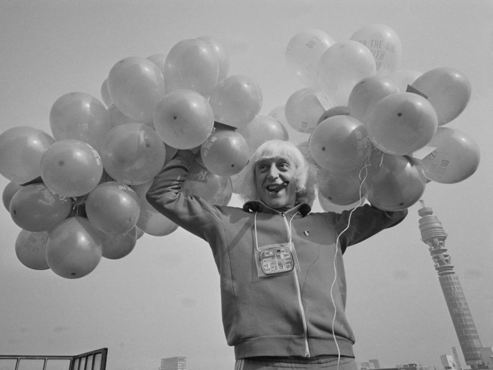 Jimmy Savile on the roof of Broadcasting House in London to celebrate the BBC Radio station’s fifth anniversary, 30 September 1972 (Getty Images)