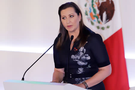 FILE PHOTO: Martha Erika Alonso, governor of the state of Puebla, delivers a speech during her swearing-in ceremony in Puebla, Mexico, December 14, 2018. REUTERS/Imelda Medina