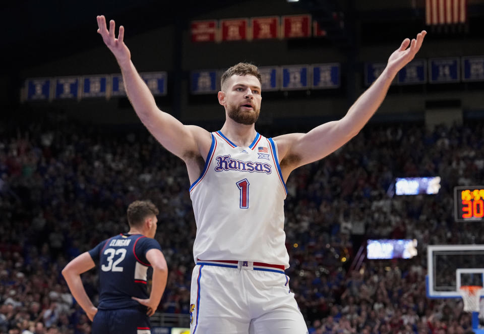 Dec 1, 2023; Lawrence, Kansas, USA; Kansas Jayhawks center Hunter Dickinson (1) celebrates after scoring against the Connecticut Huskies during the first half at Allen Fieldhouse. Mandatory Credit: Jay Biggerstaff-USA TODAY Sports