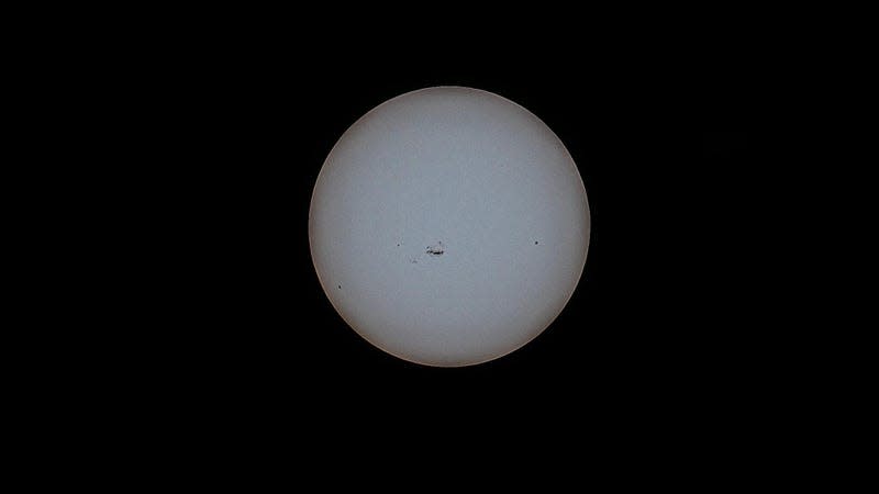 The Sun, featuring unusually large sunspots, as viewed with the Dwarf II telescope fitted with its solar filter (no external editing). - Photo: George Dvorsky