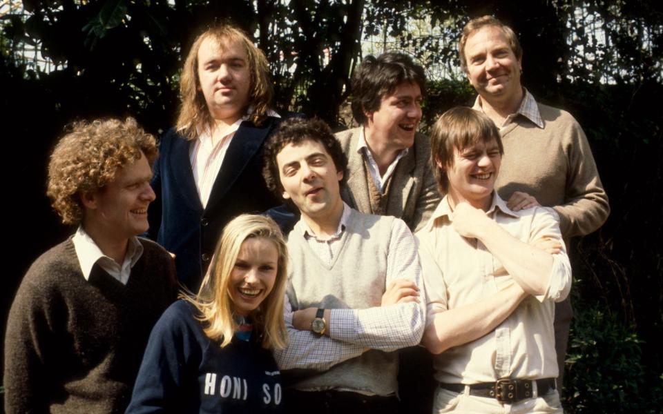 Not the Nine O’Clock News (L-R): Sean Hardie, Pamela Stephenson, Mel Smith, Rowan Atkinson, Griff Rhys Jones, John Lloyd, and Bill Wilson - BBC