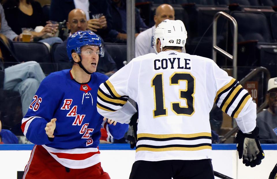 NEW YORK, NEW YORK - OCTOBER 05: Jimmy Vesey #26 of the New York Rangers drops the gloves against Charlie Coyle #13 of the Boston Bruins during the second period at Madison Square Garden on October 05, 2023 in New York City. (Photo by Bruce Bennett/Getty Images) ORG XMIT: 776027003 ORIG FILE ID: 1719604694