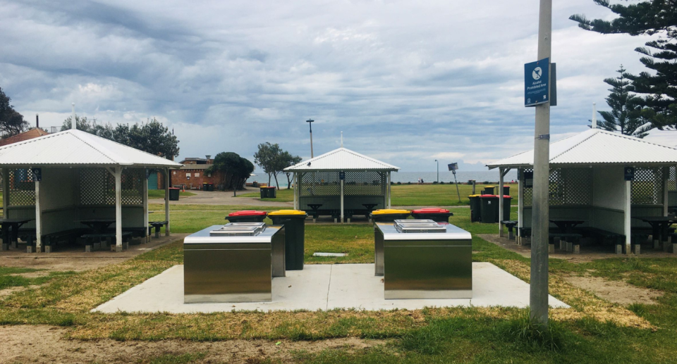 Barbecue area at a park.