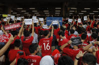 Hong Kong soccer fans turn their back and boo the Chinese national anthem as they chant "Hong Kong is not China" during the FIFA World Cup Qatar 2022 and AFC Asian Cup 2023 Preliminary Joint Qualification Round 2 soccer match between Hong Kong and Iran, in Hong Kong, Tuesday, Sept. 10, 2019. The crowd broke out into "Glory to Hong Kong," a song reflecting their campaign for more democratic freedoms in the semi-autonomous Chinese territory. (AP Photo/Kin Cheung)