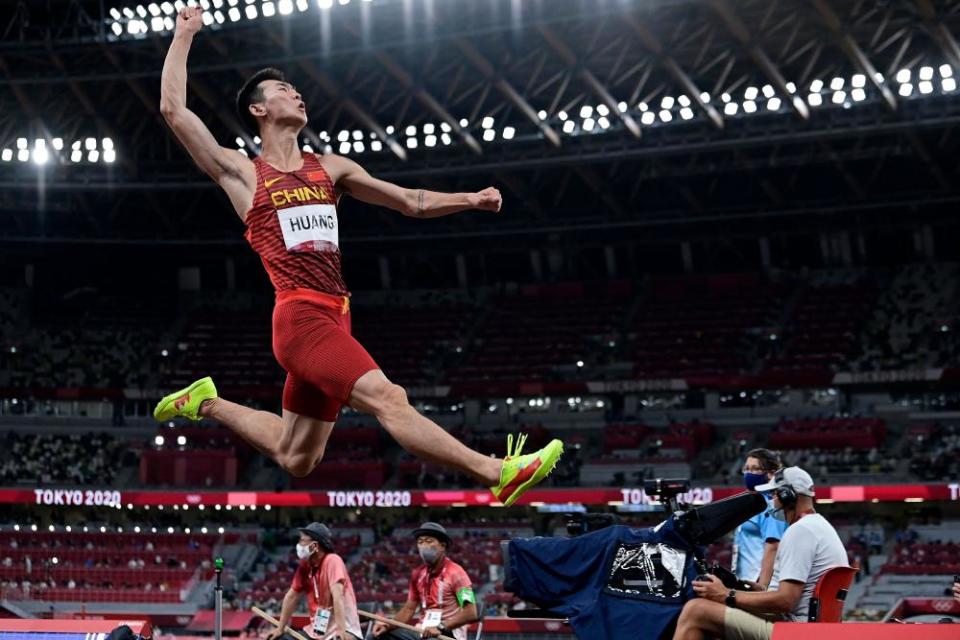 China’s Huang Changzhou competes in the men’s long jump qualification.