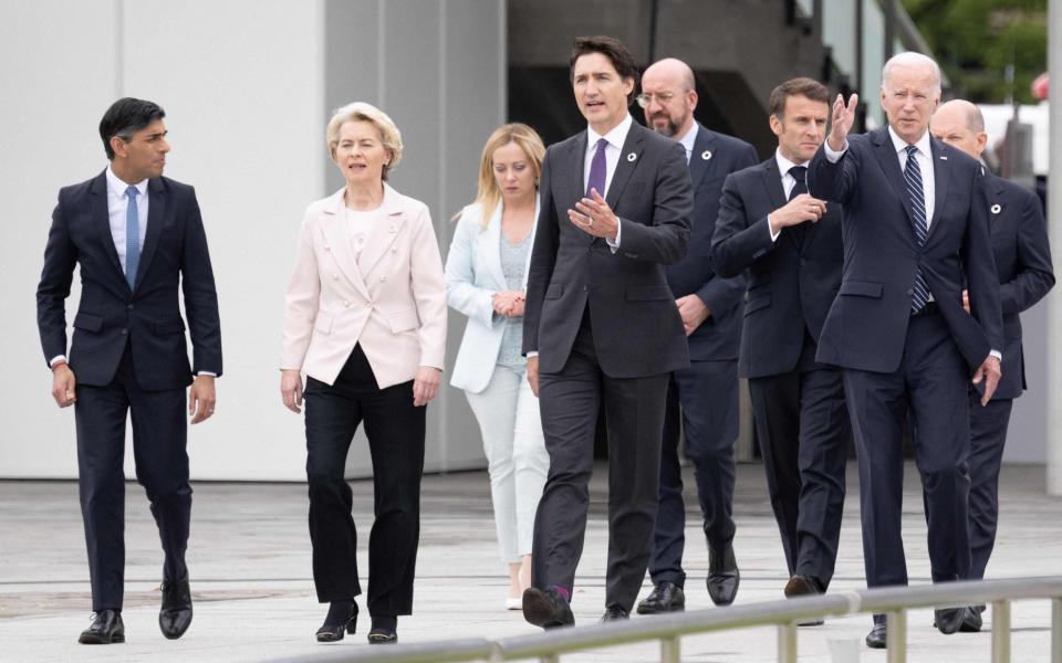 Rishi Sunak, the Prime Minister, walks with his fellow world leaders as they attend a G7 summit in Hiroshima, Japan - Jacques Witt /AFP