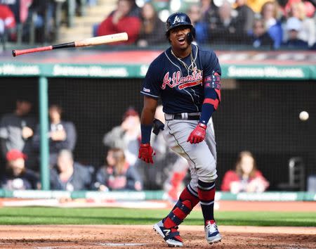 Apr 20, 2019; Cleveland, OH, USA; Atlanta Braves left fielder Ronald Acuna Jr. (13) reacts after being hit by a pitch during the third inning against the Cleveland Indians at Progressive Field. Mandatory Credit: Ken Blaze-USA TODAY Sports