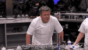 Gordon Ramsay looking over a counter with his arms bent saying "did you just say that to me?"