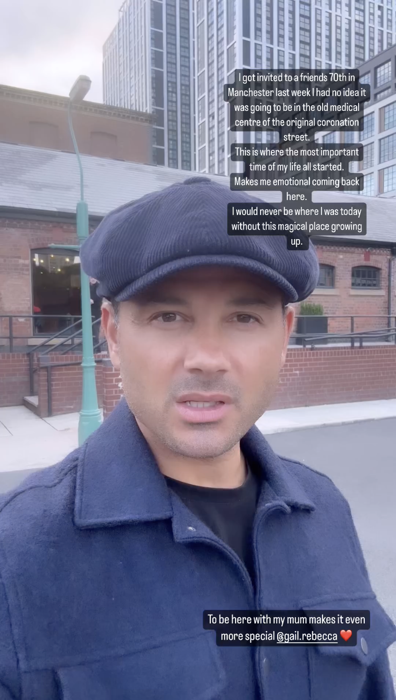 coronation street actor ryan thomas standing in front of an old medical centre film set