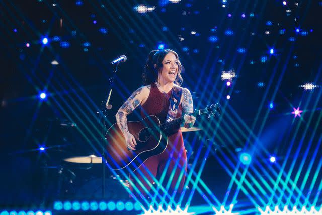 <p>Katie Kauss</p> Ashley McBryde performing in 2023