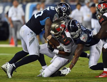 Aug 18, 2018; Nashville, TN, USA; Tampa Bay Buccaneers quarterback Jameis Winston (3) is sacked during the first half against the Tennessee Titans at Nissan Stadium. Mandatory Credit: Christopher Hanewinckel-USA TODAY Sports