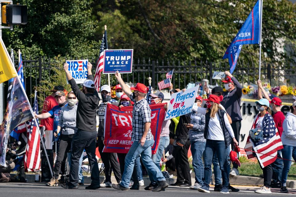 A a group consisting largely of Trump supporters gathers outside Walter Reed National Military Medical Center in Maryland on Sunday. (Photo: ALEX EDELMAN via Getty Images)