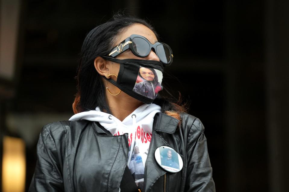 Casey Goodson Jr.'s mom, Tamala Payne, left, stands outside of the Federal Courthouse in Columbus on Friday, February 11, 2022.